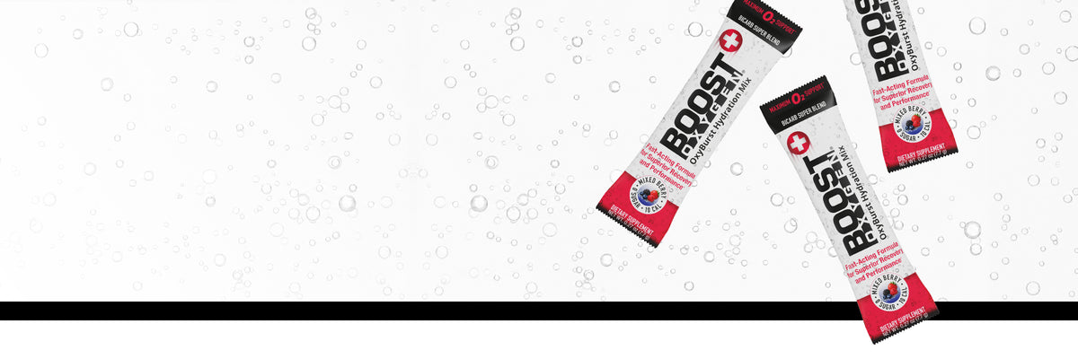 3 packets on OxyBurst floating on a white bubble background.