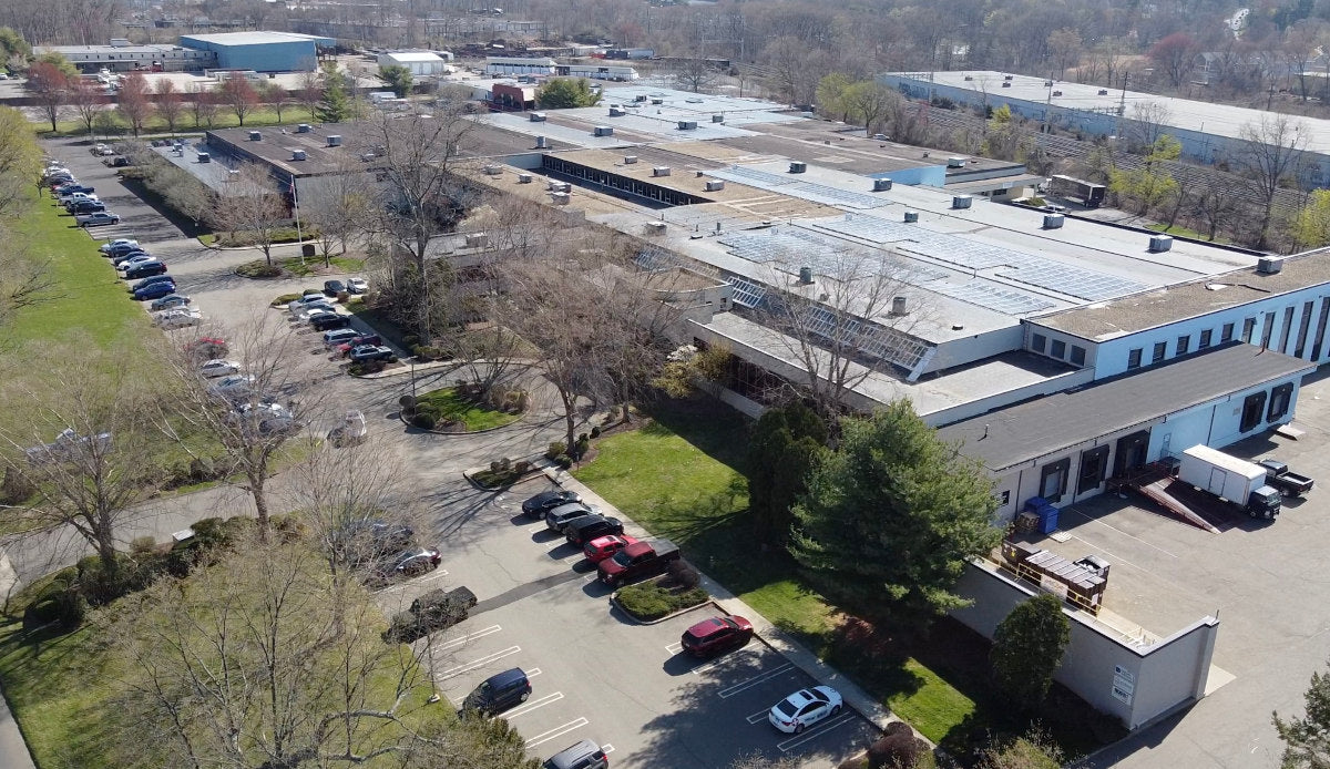 Aerial view of the Boost Oxygen building with parking lot and surrounding area.