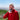 Older man in the mountains hiking using a can of Boost Oxygen.