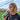 Young woman standing in front of soccer goal using Boost Oxygen Sport.