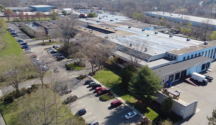 Aerial view of the Boost Oxygen building with parking lot and surrounding area.